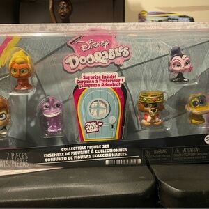 Disney Doorables Surprise Figure Set - Purple, Orange, Gold